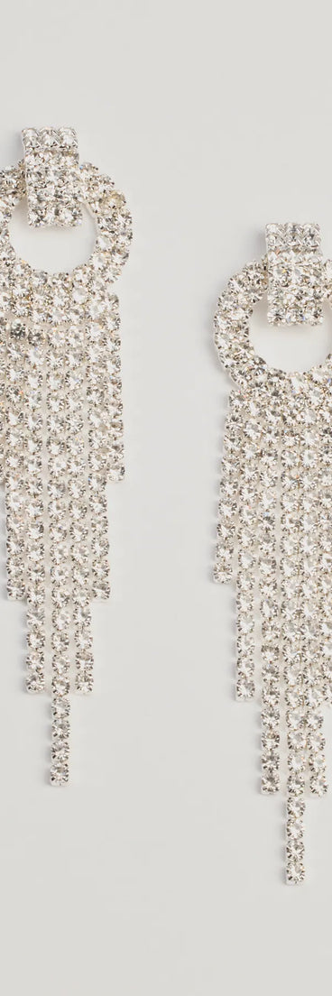 Get ready for any event with the Bold Glam Rhinestone Fringe Statement Earrings in silver, an essential start to creating a versatile outfit for women for parties, cocktail hours, or Valentine's Day events.