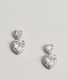 
Upgrade your style game for 2025 with the Glitzy Love Cubic Zirconia Heart Drop Earrings in silver, perfect for any fashion-forward wardrobe.