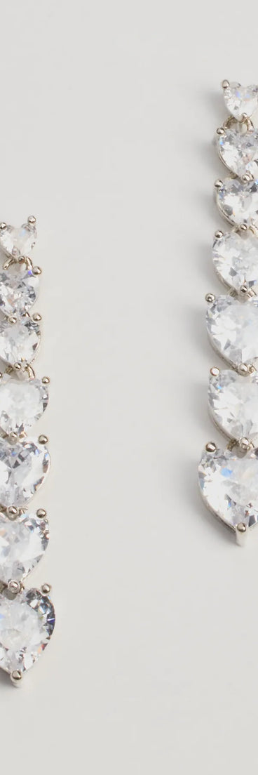 Get ready for any event with the Glam Love Heart-Shaped Cubic Zirconia Duster Earrings in silver, an essential start to creating a versatile outfit for women for parties, cocktail hours, or Valentine's Day events.