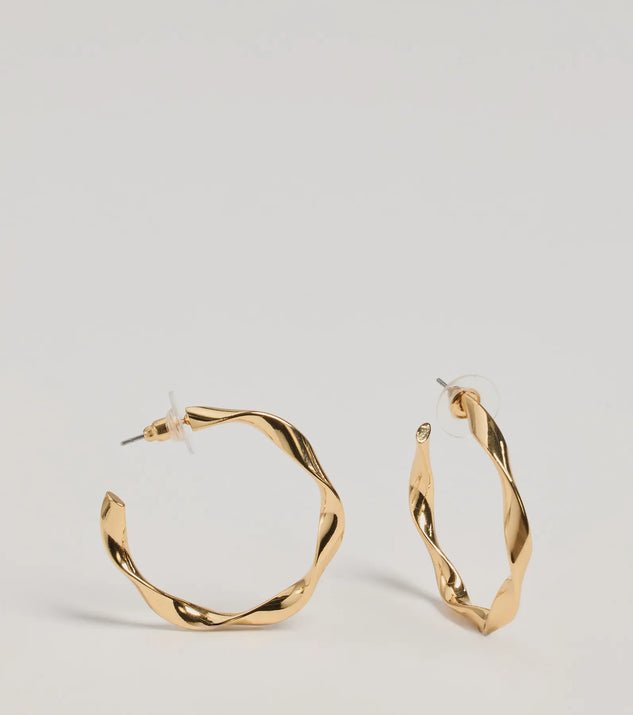 The Stunning Glam Twist Hoop Earrings in gold is a women's workwear essential with an elevated fabric and chic silhouette, ideal for layering and versatile enough to take your look from office chic to going-out ready!