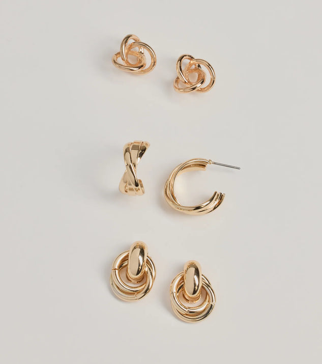 The Chic Twist Three-Pack Earrings Set in gold is a women's workwear essential with an elevated fabric and chic silhouette, ideal for layering and versatile enough to take your look from office chic to going-out ready!