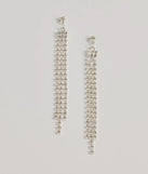 The Endless Shine Rhinestone Fringe Earrings helps create a chic silver women's cocktail outfit with a trendy texture and stylish design, ideal for wedding guest cocktail outfits or dinner parties