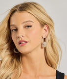 The Encircled Luxe Rhinestone Drop Earrings helps create a chic silver women's cocktail outfit with a trendy texture and stylish design, ideal for wedding guest cocktail outfits or dinner parties.