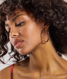 
Upgrade your style game for 2025 with the Trendy Twisted Coiled Hoop Earrings in gold, perfect for any fashion-forward wardrobe.
