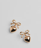 Whether you're dressing up for a romantic date or a Galentine's event, the Poised Heart Bow Earrings in gold are the perfect accessory to elevate your Valentine's Day outfit.