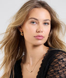 Stay on-trend this season with the Sleek Moments Three Pack Earrings Set in gold, a must-have for creating stylish and effortless spring outfits for women.