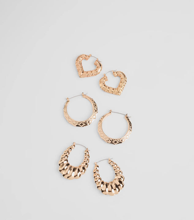 Stay on-trend this season with the Favorite Addition Three-Pack Hoop Earrings in gold, a must-have for creating stylish and effortless spring outfits for women.