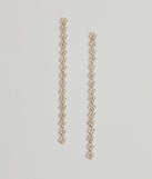 The Glam And Glisten Rhinestone Linear Earrings in gold is an elevated pick for your best outfit yet, effortlessly delivering a polished look that's sure to turn heads at any celebration.