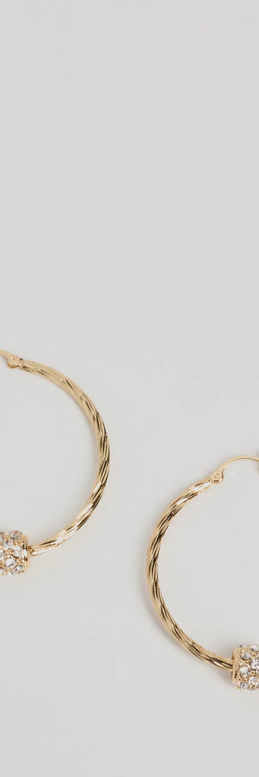 The Glitzy Touch Rhinestone Twisted Hoop Earrings in gold is an elevated pick for your best outfit yet, effortlessly delivering a polished look that's sure to turn heads at any celebration.