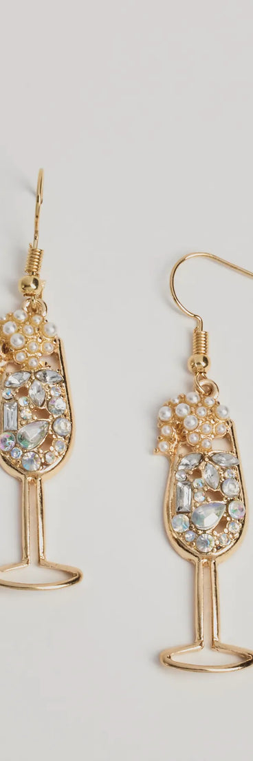 Shine at the 2025 countdown by completing your New Year’s Eve Outfit with the Pop The Bubbly Champagne Earrings, a glam gold fashion accessory with statement-making details for festive going-out looks.