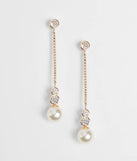 Get inspired with the Set In Stone Pearl Rhinestone Earrings, a feed-worthy gold piece that’s part of Windsor's updated and curated women’s clothing edit packed with must-have fall outfit ideas.