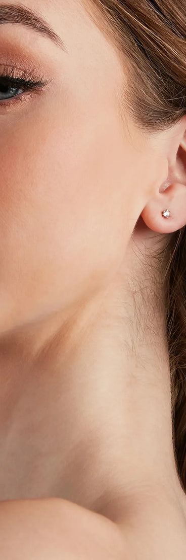 Stay on-trend this season with the Cubic Zirconia Studs Set in gold, a must-have for creating stylish and effortless spring outfits for women.