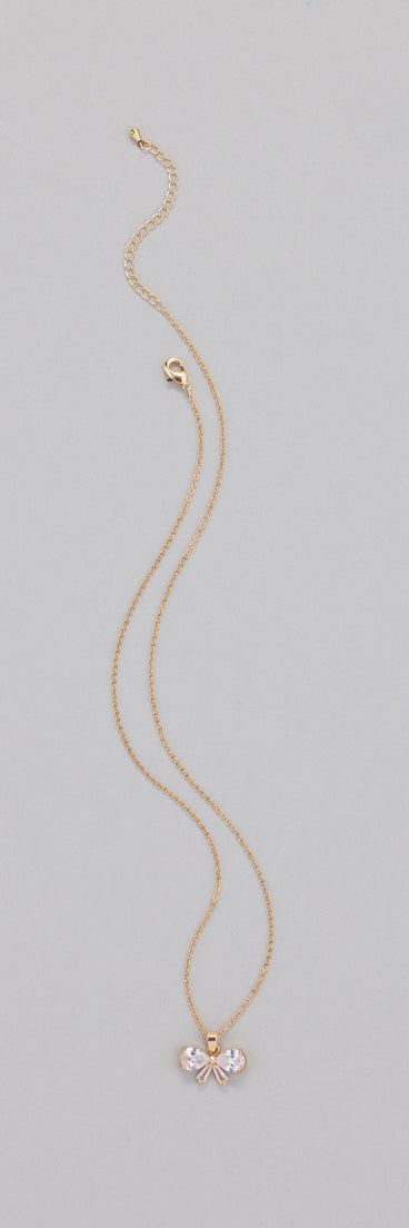 Get inspired with the Dainty Glam Cubic Zirconia Bow Charm Necklace, a feed-worthy piece that’s part of Windsor's updated and curated women’s clothing edit packed with must-have fall outfit ideas.