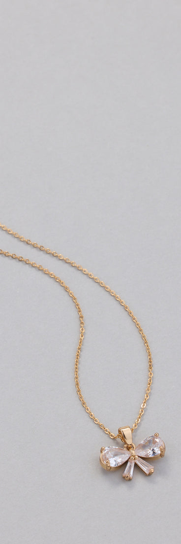 Get inspired with the Dainty Glam Cubic Zirconia Bow Charm Necklace, a feed-worthy piece that’s part of Windsor's updated and curated women’s clothing edit packed with must-have fall outfit ideas.