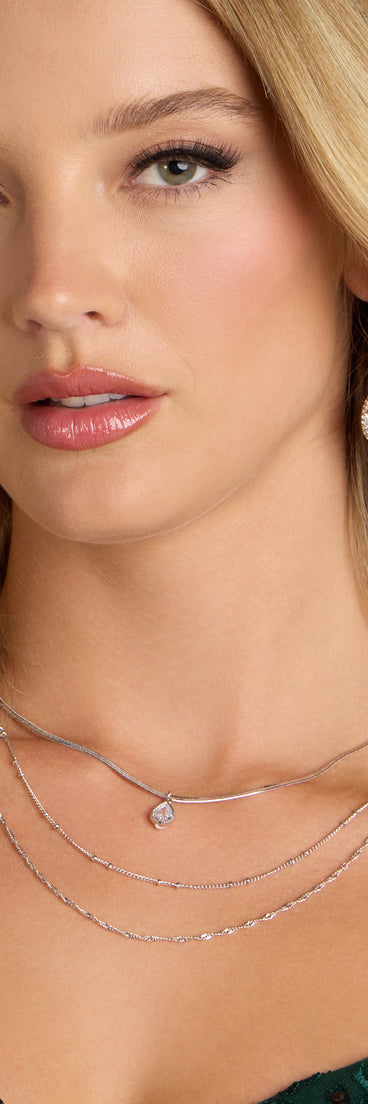 This piece brings trend-right energy to the Layers of Luxe Teardrop Cubic Zirconia Necklace, perfect for fall outfits that stand out.