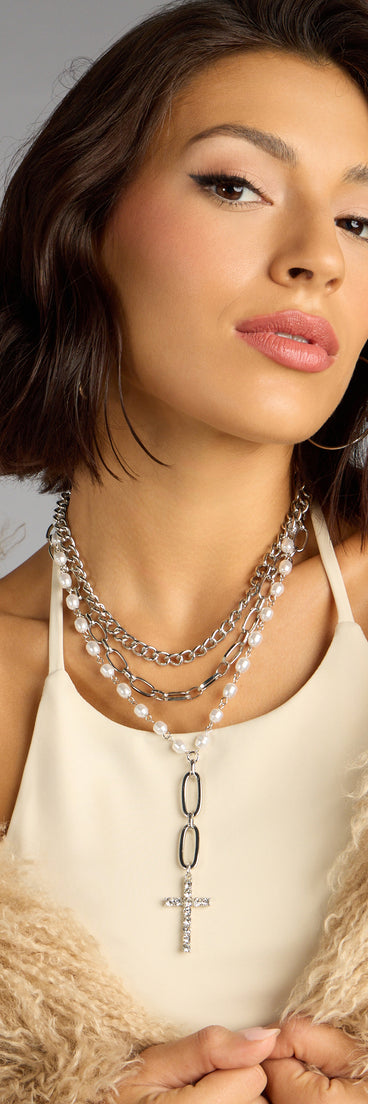 Style your vibe in seconds with the Saintly Chic Pearl And Rhinestone Cross Necklace, a fashion accessories essential that completes any outfit with ease.