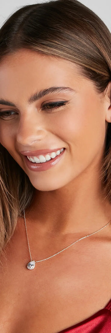 The Delicate Glam Necklace And Studs Set in gold is a women's workwear essential with an elevated fabric and chic silhouette, ideal for layering and versatile enough to take your look from office chic to going-out ready!