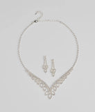 The Ultimate Glam Vibes Rhinestone Necklace And Earrings Set helps create a chic silver women's cocktail outfit with a trendy texture and stylish design, ideal for wedding guest cocktail outfits or dinner parties.