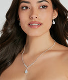 The Elegantly Chic Rhinestone Necklace And Earrings Set helps create a chic silver women's cocktail outfit with a trendy texture and stylish design, ideal for wedding guest cocktail outfits or dinner parties