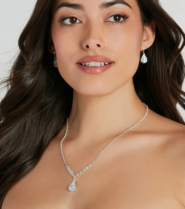 The Elegantly Chic Rhinestone Necklace And Earrings Set helps create a chic silver women's cocktail outfit with a trendy texture and stylish design, ideal for wedding guest cocktail outfits or dinner parties