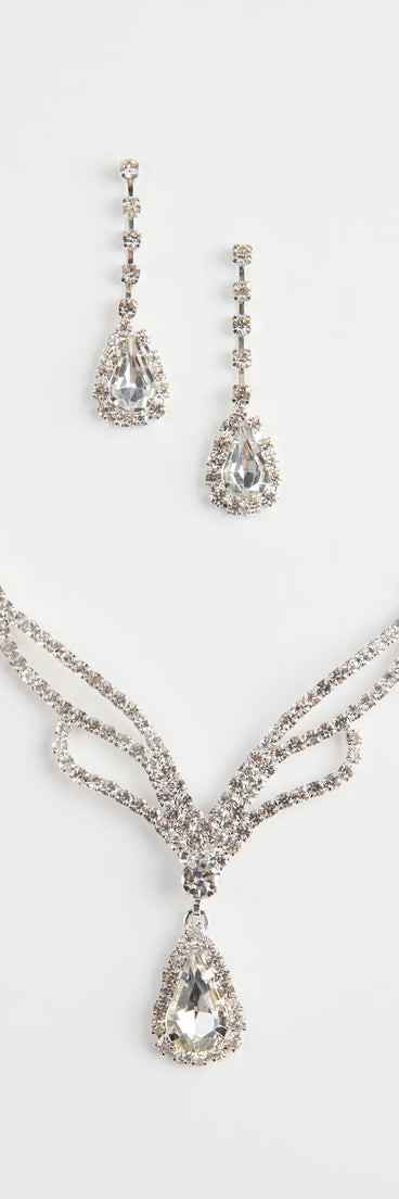 Get inspired with the Regal Teardrop Rhinestone Necklace And Earrings Set, a feed-worthy silver piece that’s part of Windsor's updated and curated women’s clothing edit packed with must-have fall outfit ideas.