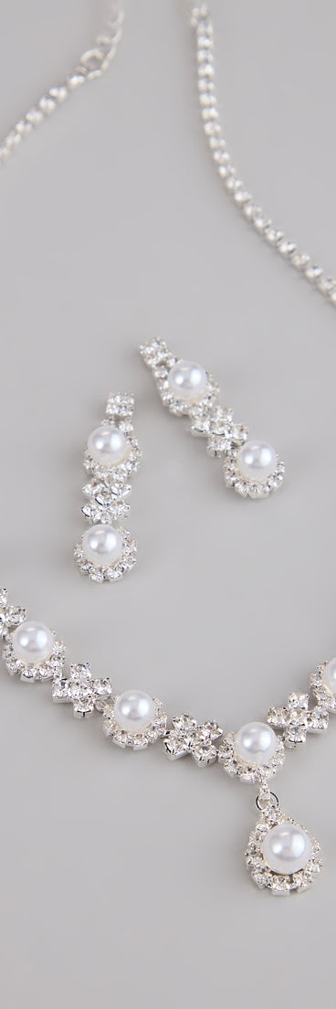 Get inspired with the Dazzling Rhinestone And Pearl Necklace And Earrings Set, a feed-worthy piece that’s part of Windsor's updated and curated women’s clothing edit packed with must-have fall outfit ideas.