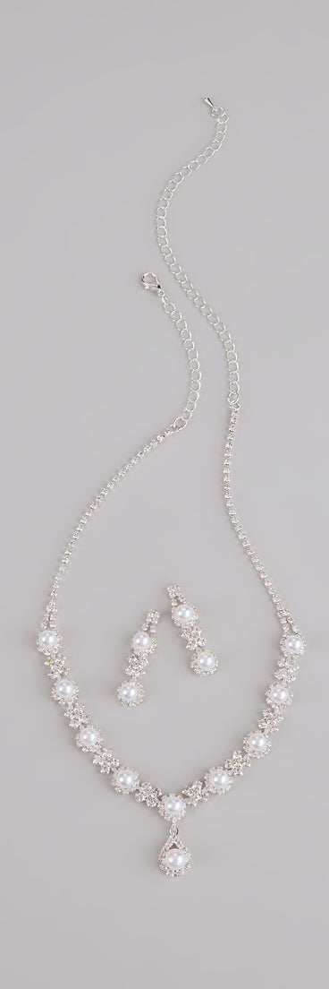 Get inspired with the Dazzling Rhinestone And Pearl Necklace And Earrings Set, a feed-worthy piece that’s part of Windsor's updated and curated women’s clothing edit packed with must-have fall outfit ideas.