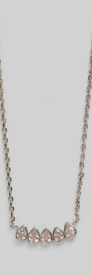 The Perfectly Pretty Cubic Zirconia Necklace helps create a chic silver women's cocktail outfit with a trendy texture and stylish design, ideal for wedding guest cocktail outfits or dinner parties.