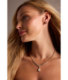 The My Moment Rhinestone Necklace And Earrings Set helps create a chic gold women's cocktail outfit with a trendy texture and stylish design, ideal for wedding guest cocktail outfits or dinner parties.