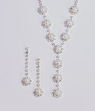 The Truly Glam Rhinestone and Pearl Lariat Necklace Set helps create a chic silver women's cocktail outfit with a trendy texture and stylish design, ideal for wedding guest cocktail outfits or dinner parties.
