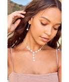 The Truly Glam Rhinestone and Pearl Lariat Necklace Set helps create a chic silver women's cocktail outfit with a trendy texture and stylish design, ideal for wedding guest cocktail outfits or dinner parties.