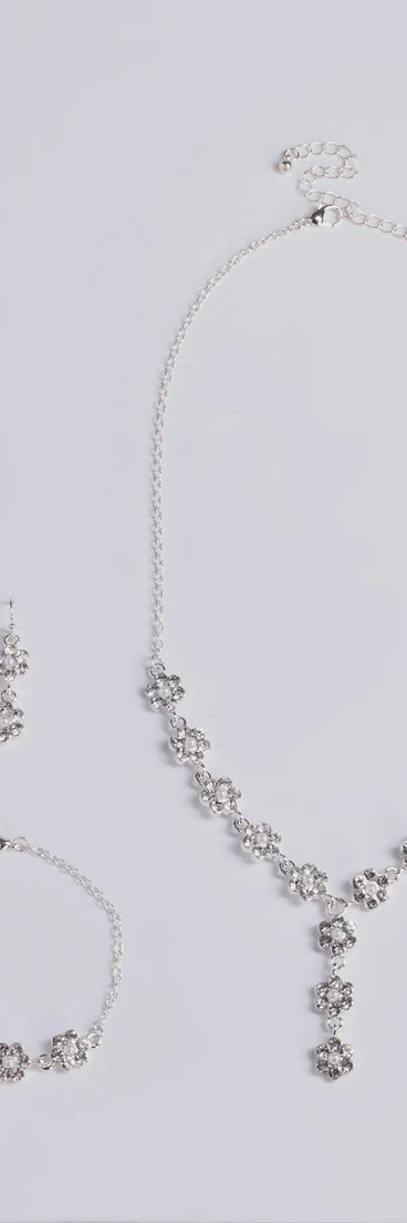 Get ready for any event with the Timeless Elegance Floral Rhinestone and Pearl Necklace Set in silver, an essential start to creating a versatile holiday outfit for women for holiday parties, cocktail hours, or NYE events.