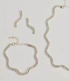 Get ready for any event with the Shine On Wavy Rhinestone Necklace, Earrings, And Bracelet Set in silver, an essential start to creating a versatile outfit for women for parties, cocktail hours, or Valentine's Day events.