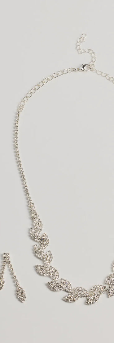 Get ready for any event with the Enchanting Glitz Rhinestone Leaf Necklace Set in silver, an essential start to creating a versatile outfit for women for parties, cocktail hours, or Valentine's Day events.
