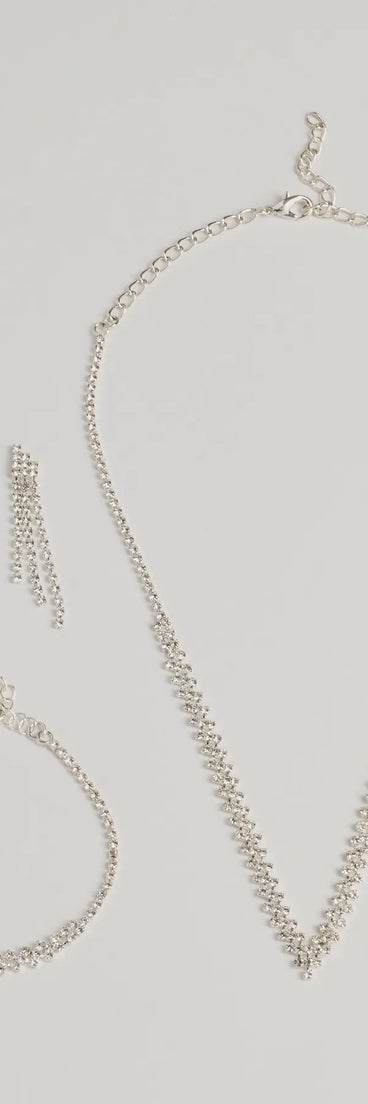 Get ready for any event with the Fabulous Sparkle Rhinestone Necklace, Earrings, And Bracelet Set in silver, an essential start to creating a versatile holiday outfit for women for holiday parties, cocktail hours, or NYE events.