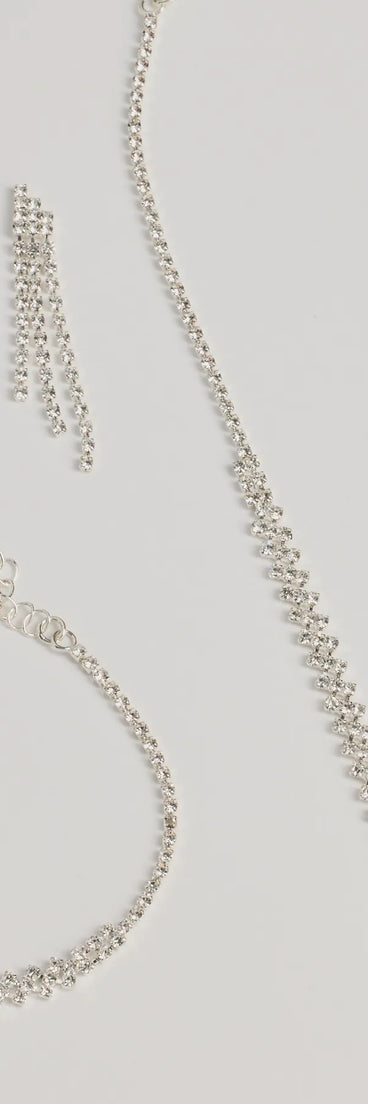 Get ready for any event with the Fabulous Sparkle Rhinestone Necklace, Earrings, And Bracelet Set in silver, an essential start to creating a versatile holiday outfit for women for holiday parties, cocktail hours, or NYE events.