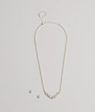 The Unforgettable Luxe Cubic Zirconia Necklace Set helps create a chic silver women's cocktail outfit with a trendy texture and stylish design, ideal for wedding guest cocktail outfits or dinner parties.