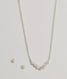 The Unforgettable Luxe Cubic Zirconia Necklace Set helps create a chic silver women's cocktail outfit with a trendy texture and stylish design, ideal for wedding guest cocktail outfits or dinner parties.