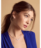 The Unforgettable Luxe Cubic Zirconia Necklace Set helps create a chic silver women's cocktail outfit with a trendy texture and stylish design, ideal for wedding guest cocktail outfits or dinner parties.