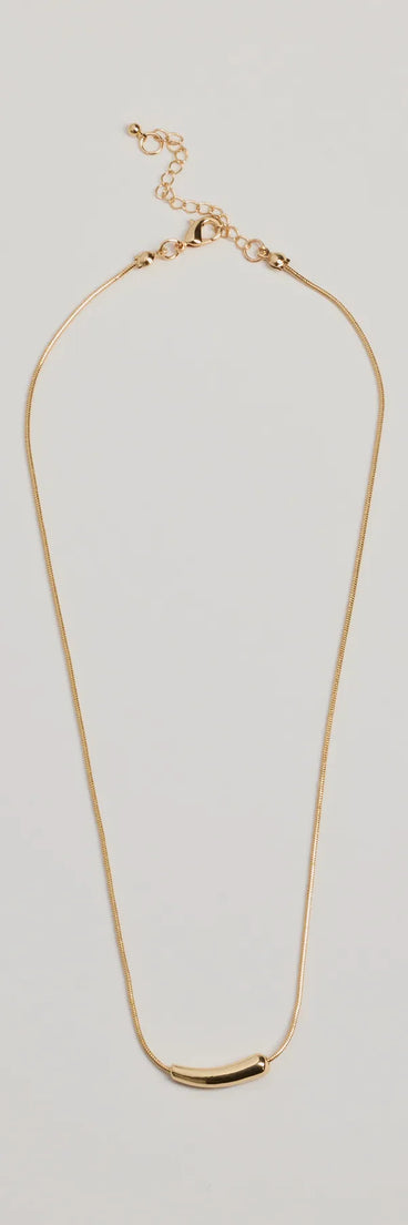 The Dainty Luxe Bar Charm Necklace in gold is a women's workwear essential with an elevated fabric and chic silhouette, ideal for layering and versatile enough to take your look from office chic to going-out ready!
