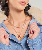 A Initial Layered Bubble Necklace, a trendy gold addition to women's going-out outfits, is ideal for Christmas party outfits, chic NYE attire, or winter night-out looks that keep you on-trend!