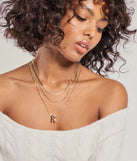 R Initial Layered Bubble Necklace, a trendy gold addition to women's going-out outfits, is ideal for Christmas party outfits, chic NYE attire, or winter night-out looks that keep you on-trend!
