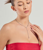 The Simple Glitz Rhinestone Lariat Necklace And Stud Earrings Set helps create a chic silver women's cocktail outfit with a trendy texture and stylish design, ideal for wedding guest cocktail outfits or dinner parties.