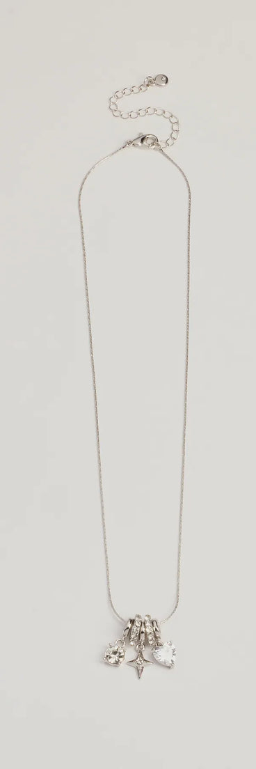 The Unique Charm Multiple Pendant Necklace helps create a chic silver women's cocktail outfit with a trendy texture and stylish design, ideal for wedding guest cocktail outfits or dinner parties.