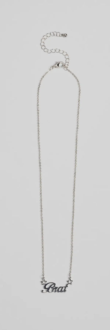 The Brat Script Dainty Chain Necklace in silver brings edge and energy to your vibe, ready to elevate any festival look or concert outfit.