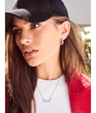 The Brat Script Dainty Chain Necklace in silver brings edge and energy to your vibe, ready to elevate any festival look or concert outfit.