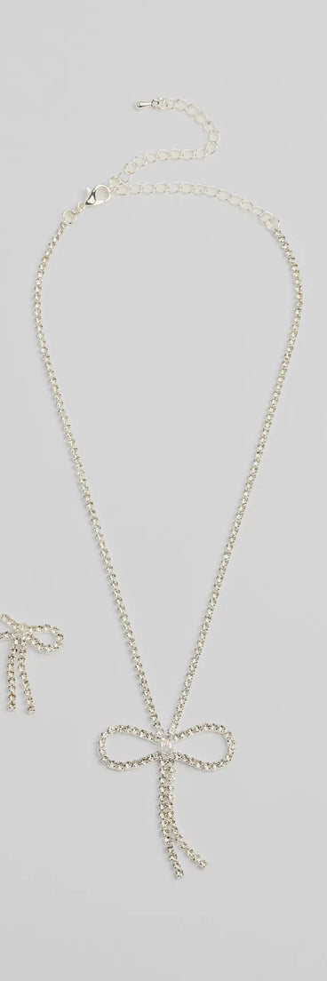 Get inspired with the Adorably Glam Bow Necklace And Earrings Set, a feed-worthy silver piece that’s part of Windsor's updated and curated women’s clothing edit packed with must-have fall outfit ideas.