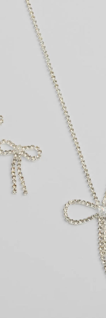Get inspired with the Adorably Glam Bow Necklace And Earrings Set, a feed-worthy silver piece that’s part of Windsor's updated and curated women’s clothing edit packed with must-have fall outfit ideas.