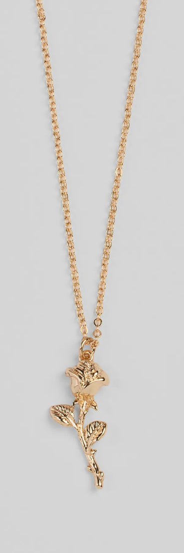 Whether you're dressing up for a romantic date or a Galentine's event, the Divine Enchantment Rose Charm Necklace in gold is the perfect accessory to elevate your Valentine's Day outfit.