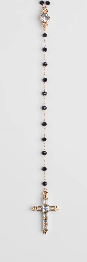 The Beaded Beauty Rhinestone Cross Necklace in black brings edge and energy to your vibe, ready to elevate any festival look or concert outfit.
